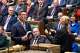 Andy Burnham, front left, is sworn-in as an MP in the House of Common in London, England, Monday, June 22, 2026. (House of Commons via AP)