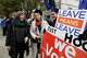 FILE - British conservative lawmaker Anna Soubry, centre, who campaigned to remain in the European Union during referendum debates, reacts with pro-Brexit protesters outside parliament in London, Thursday Jan. 10, 2019.