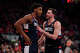 NBA Draft live updates: UConn’s Reed Jr. to Spurs, Karaban awaits pick 1 NEW YORK, NEW YORK - FEBRUARY 06: Tarris Reed Jr. #5 and Alex Karaban #11 of the Connecticut Huskies huddle during the game against the St. John's Red Storm at Madison Square Garden.