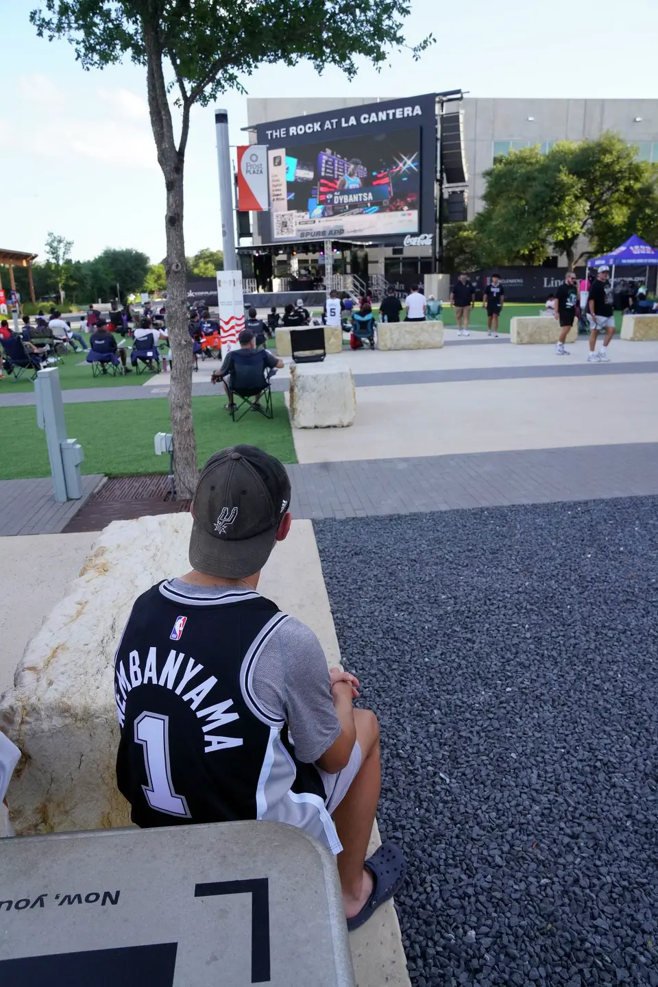 Fans watch the NBA draft during Tuesday's watch party at the Victory Performance Center at the Rock at La Cantera.