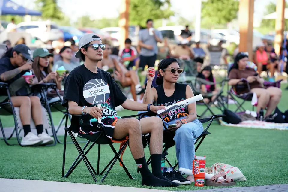 Fans watch the NBA draft during Tuesday's watch party at the Victory Performance Center at the Rock at La Cantera.