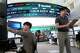 Currency traders work near a screen showing the Korea Composite Stock Price Index (KOSPI) and the foreign exchange rate between U.S. dollar and South Korean won at the foreign exchange dealing room of the Hana Bank headquarters in Seoul, South Korea, Wednesday, June 24, 2026.