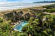 Amy’s Kitchen’s former CEO is selling a $16 million Stinson Beach retreat at 172 Seadrift Road. The Bali-inspired compound has five discrete bedrooms, a pool and ocean views.