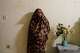 A 50-year-old woman who said she was abducted and sexually assaulted for four months by the Rapid Support Forces, or RSF, before escaping, poses for a portrait following an interview with The Associated Press in Omdurman, Sudan, Sunday, April 19, 2026.