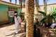 Tariq Abuzeid, 52, who lost his leg in a shelling attack, walks in the patio of his home in Omdurman, Sudan, Saturday, April 25, 2026.