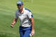 Viktor Hovland gives the thumbs up to fans after finishing the second round of the Travelers Championship at TPC River Highlands in Cromwell, Conn., Friday, June 26, 2026.