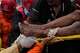 Rescue workers transportation Patrick Vargas aft pulling him from the rubble 2 days aft an earthquake struck Catia la Mar, Venezuela, Friday, June 26, 2026.