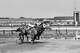 FILE - Seabiscuit leads local horse Aneroid by a nose in the Brooklyn Handicap at the Aqueduct race track in New York on June 26, 1937.