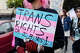 Participants walk in the Trans March in San Francisco on Friday.
