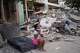A pistillate cries adjacent to damaged buildings 3 days aft an earthquake struck successful La Guaira, Venezuela, Saturday, June 27, 2026.