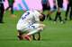 Uzbekistan's Sherzod Nasrullaev (13) reacts to a loss during the World Cup Group K soccer match between DR Congo and Uzbekistan in Atlanta, Saturday, June 27, 2026.