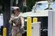 FILE - A U.S. Marine patrols outside of a federal building, June 13, 2025, in Los Angeles