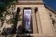 FILE - A giant portrait of President Donald Trump looks down from the Justice Department in Washington, June 2, 2026.
