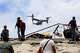 A U.S. aircraft flies over an area struck by earthquakes in La Guaira, Venezuela, Sunday, June 28, 2026.