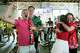 Canada fans Derrick Smith, center, Benedict Geaghan and Holly Andrews cheer after Canada scored against South Africa in a knockout round match during a World Cup watch party at Pitch 25 in Houston, Sunday, June 28, 2026.