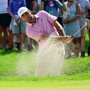 Scheffler forces Monday playoff with Hovland at Travelers. Ryu wins KPMG Women's PGA