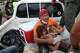 A rescuer carries a girl pulled from the rubble four days after twin earthquakes struck La Guaira, Venezuela, Sunday, June 28, 2026.