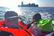 In this photo released by Dong Guangping, Dong Guangping is seen on a dinghy, crossing the sea between China and South Korea, on May 24, 2026. (Dong Guangping via AP)