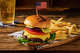 Ford's Garage is running a July 1-4 promotion featuring an American Standard Burger.