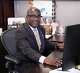 James Douglas, Associate Director of the VA North Texas Health Care System, works at his desk in Dallas.