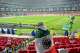 A Mexican fan waits in the rain for the start of the World Cup round of 32 soccer match between Mexico and Ecuador in Mexico City, Tuesday, June 30, 2026.