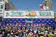 Para kontestan bersaing memperebutkan gelar putri pada kompetisi makan hot dog Nathan's Famous Fourth of July 2025 di Coney Island di New York pada tanggal 4 Juli 2025. (Warga SF Tandra Childress adalah pesaing keempat dari kiri.)