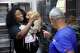 Jashanti Mackey of Fort Worth picks out a puppy for her autistic son Josiah as she looked through the dogs available at the Chuck & Brenda Silcox Animal Care & Adoption Center, in Fort Worth, July 1, 2026.