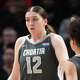 Olivia Vukosa of Team World celebrates with teammate Emma Broliron in the second half during the 2026 Nike Hoop Summit at Moda Center on April 11, 2026 in Portland, Oregon. (Photo by Soobum Im/Getty Images)