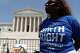 Activists celebrate the Supreme Court's birthright citizenship ruling outside of the Supreme Court on Capitol Hill, Tuesday, June 30, 2026, in Washington.