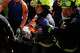 Chilean rescue workers carry Hernán Alberto Gil Flores after he was pulled from the rubble eight days after he was trapped by twin earthquakes that struck Catia La Mar, Venezuela, Thursday, July 2, 2026.