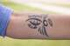 Sue Beatty, the mother of Carly Beatty who died in a DUI accident in 2019, shows a tattoo in honor of her daughter at Ducan Park in Frisco, Texas, Wednesday, July 1, 2026.
