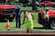 A crew lays a new layer of asphalt at the entrance to Sage Park in Berlin on July 2, 2026 as temperatures reached into the upper 90s.