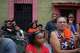 Neighbors stand outside the San Judas Tadeo school after part of the building collapsed in Caracas, Venezuela, Friday, July 3, 2026, days after it was damaged by the earthquakes.