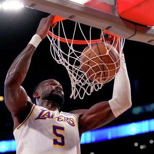 Lakers sending Ayton to the Wizards for Hardy and 2 second-round picks, AP source says
