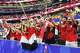 John Hanna of Tampa (center) cheers as Egypt players go around the field to greet the crowd following their side’s win during a FIFA World Cup Round of 32 match against Australia, on Friday, July 3, 2026 , at Dallas Stadium in Arlington.