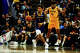 Warriors first-round draft pick Yaxel Lendeborg pushes the ball upcourt in front of Los Angeles Lakers forward Anton Watson during a California Classic game Friday at Chase Center.