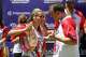 Miki Sudo, left, and Joey Chestnut participate in the Nathan's Famous Fourth of July International Hot Dog Eating Contest weigh-in ceremony at Hudson Yards on Friday, July 3, 2026, in New York. (Photo by Andy Kropa/Invision/AP)