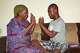 Kadiatou Diallo spends time with her autistic child, Kazaliou Balde, at their home in Fria, Guinea, Saturday, May 16, 2026.