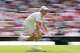 Jannik Sinner of Italy runs for a return to Miomir Kecmanovic of Serbia during the men's singles match at the Wimbledon Tennis Championships in London, Monday, June 29, 2026.