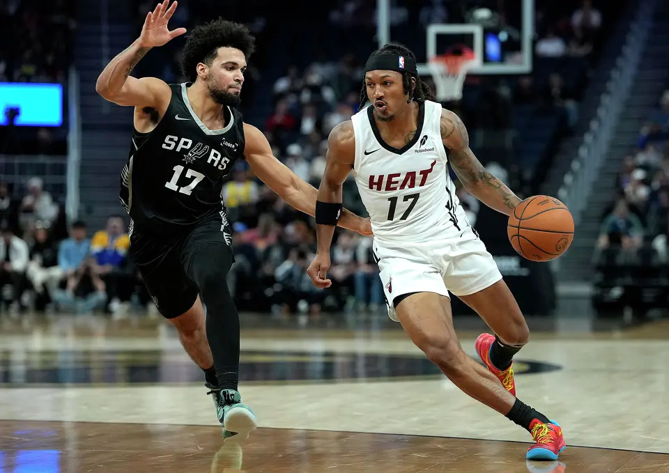 SAN FRANCISCO, CALIFORNIA - JULY 03: Ja'Kobi Gillespie #17 of the San Antonio Spurs defends Jahmir Young #17 of the Miami Heat during the first half in the California Classic, an NBA Summer League game, at Chase Center on July 03, 2026 in San Francisco, California.