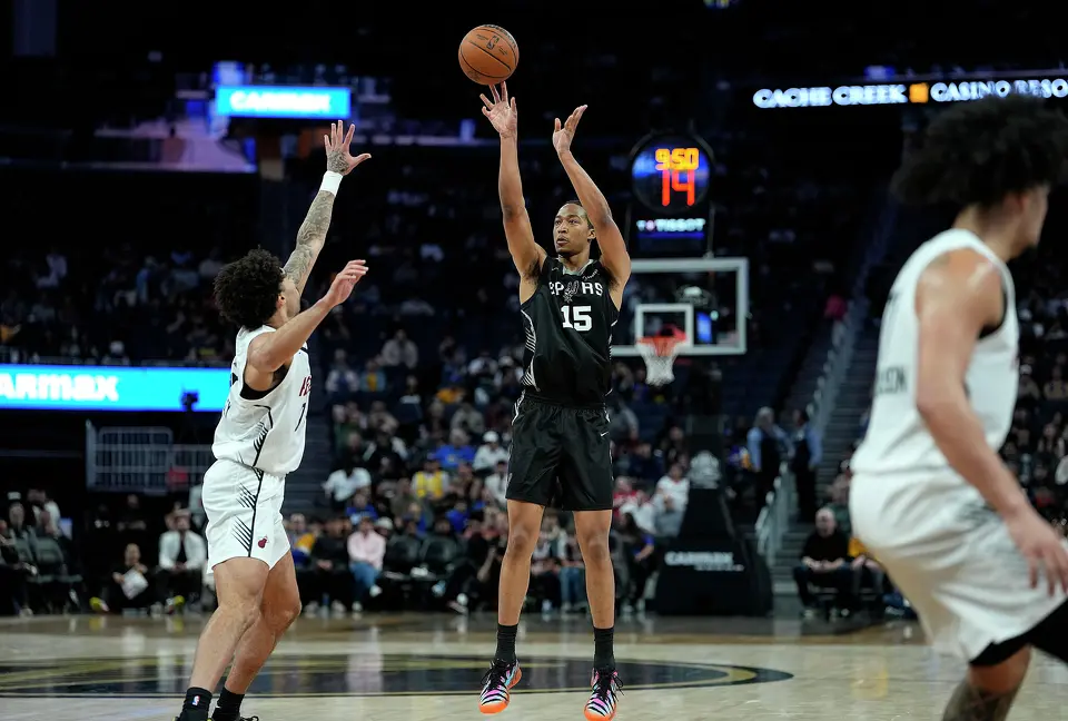 SAN FRANCISCO, CALIFORNIA - JULY 03: Maliq Brown #15 of the San Antonio Spurs shoots a three-point shot against the Miami Heat during the second half in the California Classic, an NBA Summer League game, at Chase Center on July 03, 2026 in San Francisco, California.
