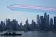 Military planes perform a flyover of the Hudson River, above the the Manhattan skyline, as seen from Weehawken, N.J., Saturday, July 4, 2026.