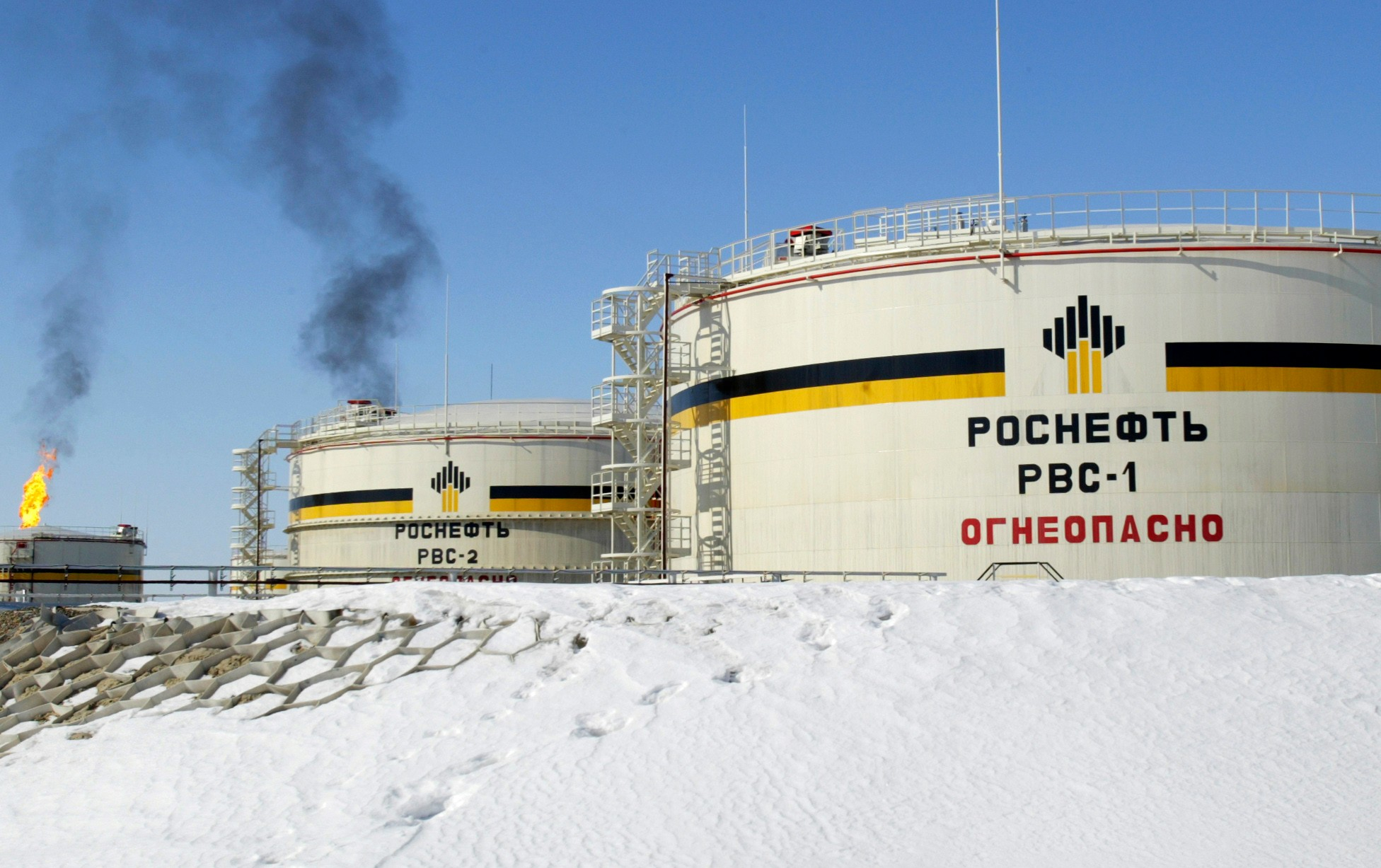 OPEC+ countries agree to expand monthly oil production modestly as prices slide