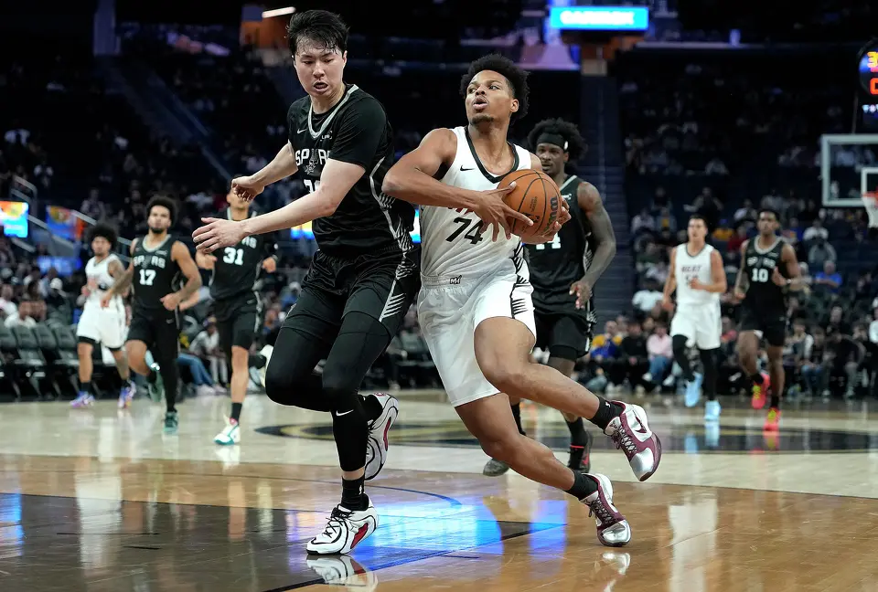 Keyshawn Hall #74 of the Miami Heat on a fast break drives towards the basket on Hyunjung Lee #26 of the San Antonio Spurs during the first half in the California Classic a NBA Summer League game at Chase Center on July 03, 2026 in San Francisco, California.