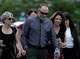 Father, center, and mother, second right, of Tyler Robinson arrive at the Fourth District Courthouse, Tuesday, July 7, 2026, in Provo, Utah, ahead of a hearing for Tyler Robinson, accused in the fatal shooting of Charlie Kirk.