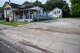 Dried blood sits next to the sidewalk on the 6800 block of Canal Street after a shooting occurred in Houston, Tuesday, July 7, 2026.