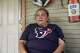 Gracey Mindiola, 58, a resident who lives three houses from the scene of an officer-involved shooting during a federal immigration enforcement operation, is photographed outside of her home in Houston on Tuesday, July 7, 2026. The shooting is under investigation by the Federal Bureau of Investigation.