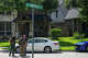 Immigration and Customs Enforcement officers stand outside of a residence on Saint Winfred street after a man who they were pursuing barricaded himself inside the house in Spring, Wednesday, July 8, 2026.