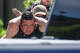 Immigration and Customs Enforcement officers arrest a man who the agency said they were pursuing barricaded himself inside the house in Spring, Wednesday, July 8, 2026.