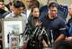 Lorenzo Salgado Jr., left, and Ronaldo Salgado, right, sons of Lorenzo Salgado Araujo, are shown during a news conference about the ICE shooting death of their father in Houston Wednesday, July 8, 2026.